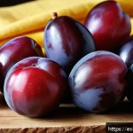 Home 23 전통 방식으로 만드는 매실청 - A vibrant close-up of ripe plums freshly picked from an organic orchard, showing a mix of deep red a...